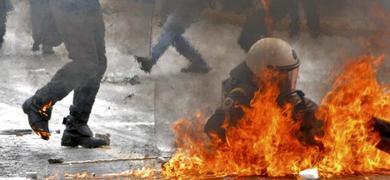 Tres muertos en el incendio de un banco atacado por los manifestantes en la huelga general de Atenas