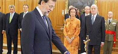 Rajoy confa a De Guindos y Montoro la salida de la crisis