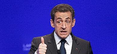 Sarkozy niega las acusaciones de DSK y pide que se calle