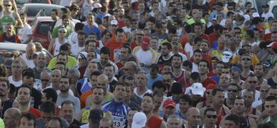 El portugus Paolo Soares y la islea Raquel Lpez, ganadores de la  Media Maratn 